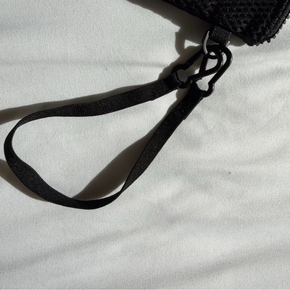 Dagne Dover Air Mesh Black Pouch Wristlet